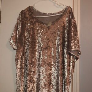 Silver/gray shirt that can be dressed up for a casual look.